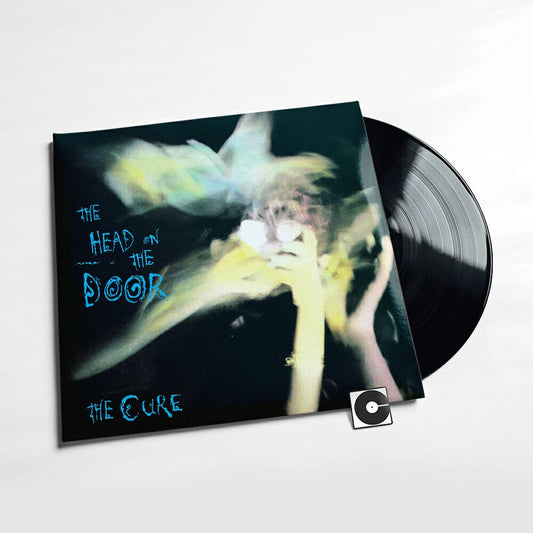 The Cure - "The Head On The Door"