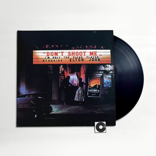 Elton John - "Don't Shoot Me I'm Only The Piano Player"
